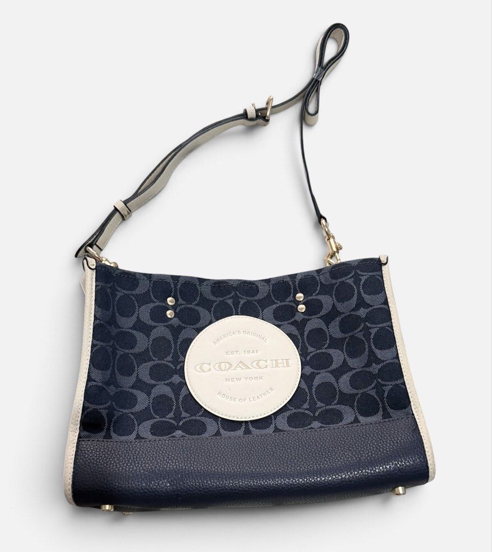 COACH DEMPSEY CARRYALL SHOULDER BAG (Category: Shoulder Bags) located in Dasmarinas. Submitted by nvrgobrkagain. (Listing ID 1464588095, Image 1). Description: AUTH 💯 WIDTH : 9 INCHES HEIGHT : 10.5 INCHES ISSUE : ONE MINIMAL RUB UNDER THE LEATHER AND A MINIMAL COLOR TRANSFER (CAN BE REMOVED) ALL DETAILED PICS POSTED 🖤 MEETUP/SHIPPING AVAILABLE 📩.
