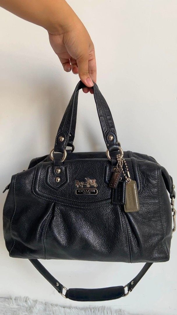 Coach Madison Audrey (Category: Luxury Bags & Wallets) located in Bulacan. Submitted by bella.ken.varietystore (Listing ID 1464662178, Image 1). Description: Black leather Coach handbag. Features silver hardware and a purple interior lining. Has top handles and a detachable shoulder strap. Includes Coach hang tags. Great for everyday use or special occasions. Plenty of space inside for your essentials..