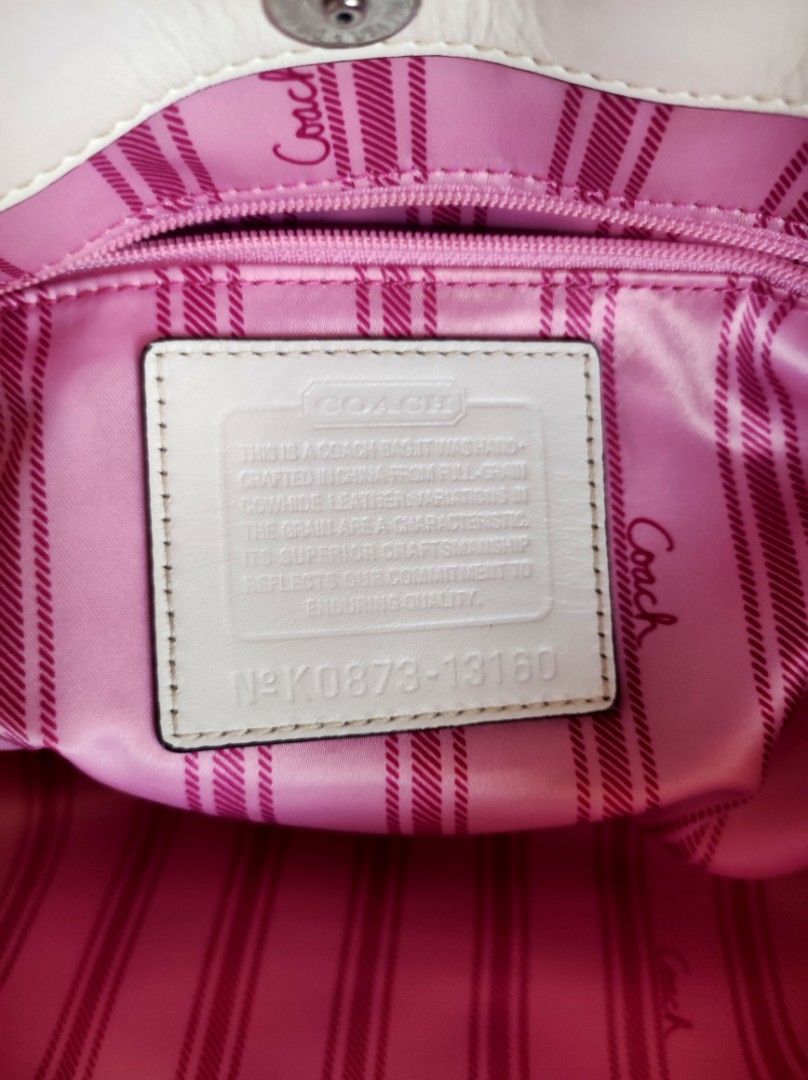 Coach Penelope (Category: Luxury Bags & Wallets) located in Naguilian. Submitted by a2aonlineshop (Listing ID 1464617195, Image 2). Description: style # : 13160 color: cream model: Coach Penelope Satchel/Tote Bag Manufactured Date: November, 2008 Material: Pebbled Leather with Satin Lining Features: 3 section compartment (magnetic snap button back & fort side & zipper in the middle), zipper pocket in front Inclusion: Dust Bag Flaw: light yellow s