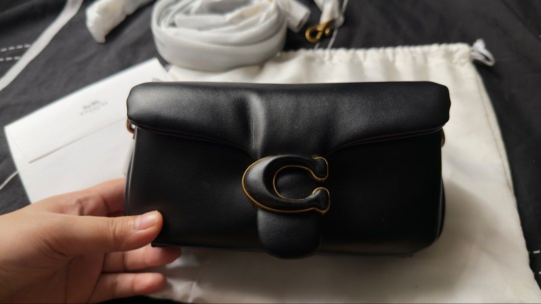 Coach Pillow Tabby Shoulder Bag 18 Black (Category: Shoulder Bags) located in Manila. Submitted by msprsdntgo (Listing ID 1464576246, Image 2). Description: It was purchased nearly two years ago and has been used only a few times. RFS: I am barely using it and I'm also decluttering. * Still Negotiable SF will be shouldered by the buyer. Meetup - Makati Homes 1.
