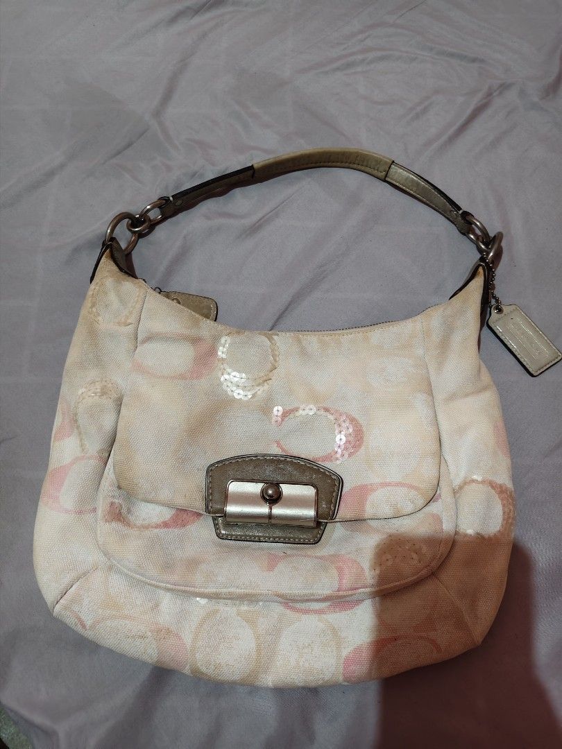 Coach sequin hobo bag (Category: Shoulder Bags) located in Alburquerque. Submitted by dzm.ancn0 (Listing ID 1464707759, Image 1). Description: authentic coach hobo bag w/ sling No rubs, malinis ang loob honest issue: faded color sa canvas at watermark sa strap.