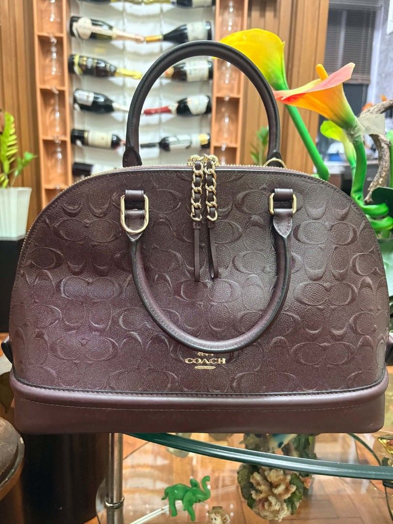 Coach Sierra Tote Shoulder Bag (Category: Shoulder Bags) located in Makati City. Submitted by emem.pre.owned.ph (Listing ID 1464586412, Image 2). Description: -Coach Burgundy Sierra Tote Shoulder Bag -excellent condition -strap included and dustbag -bought US.