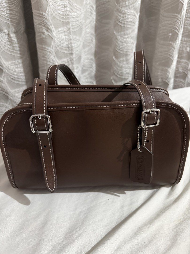 Coach Swing Zip Maple bag (Category: Luxury Bags & Wallets) located in Iligan City. Submitted by peachylovessoup (Listing ID 1464730564, Image 1). Description: - Authentic Coach Swing Zip in Maple color - Clean, structured silhouette perfect for daily use - Perfect cozy color for the colder months ahead 🍂 -Very good condition overall, just has a small minor crease and could use a little cleaning -Last photo is not mine, just for inspo MOP: GCASH