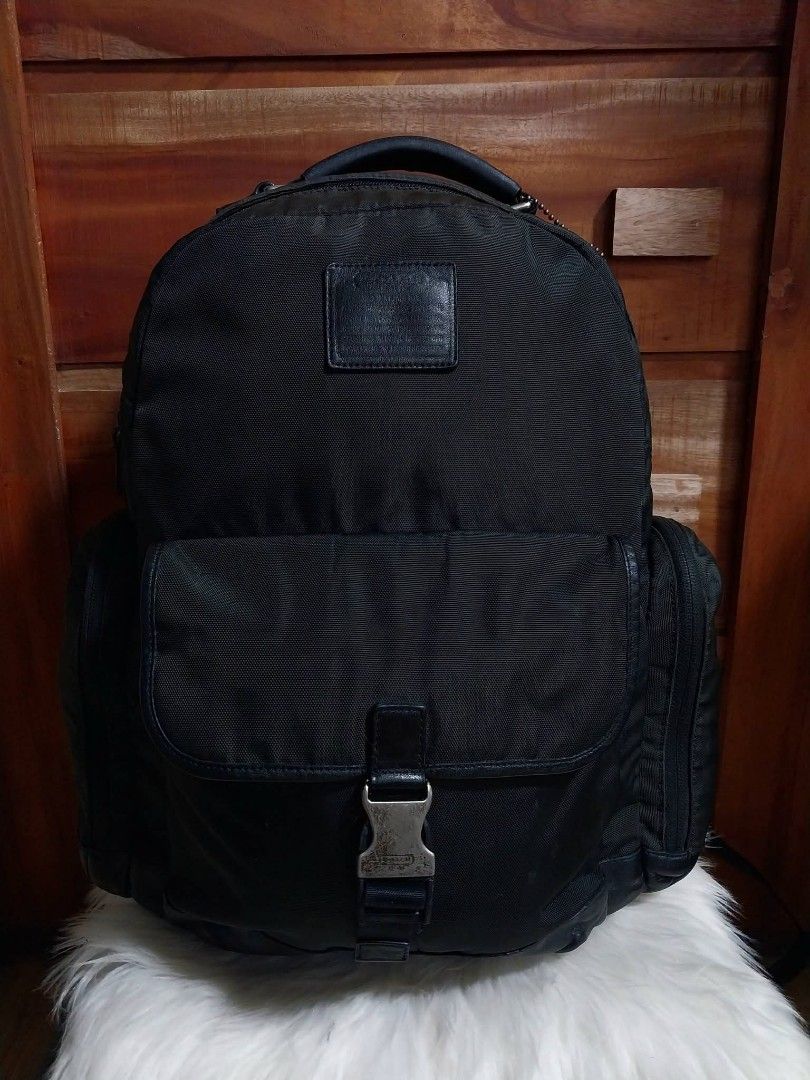 COACH VOYAGER BACKPACK (Category: Luxury Bags & Wallets) located in Cagayan de Oro. Submitted by lj100614 (Listing ID 1464731045, Image 1). Description: COACH VOYAGES BACKPACK in Black Nylon and Leather ukay/preloved large-xl minimal sign of usage.