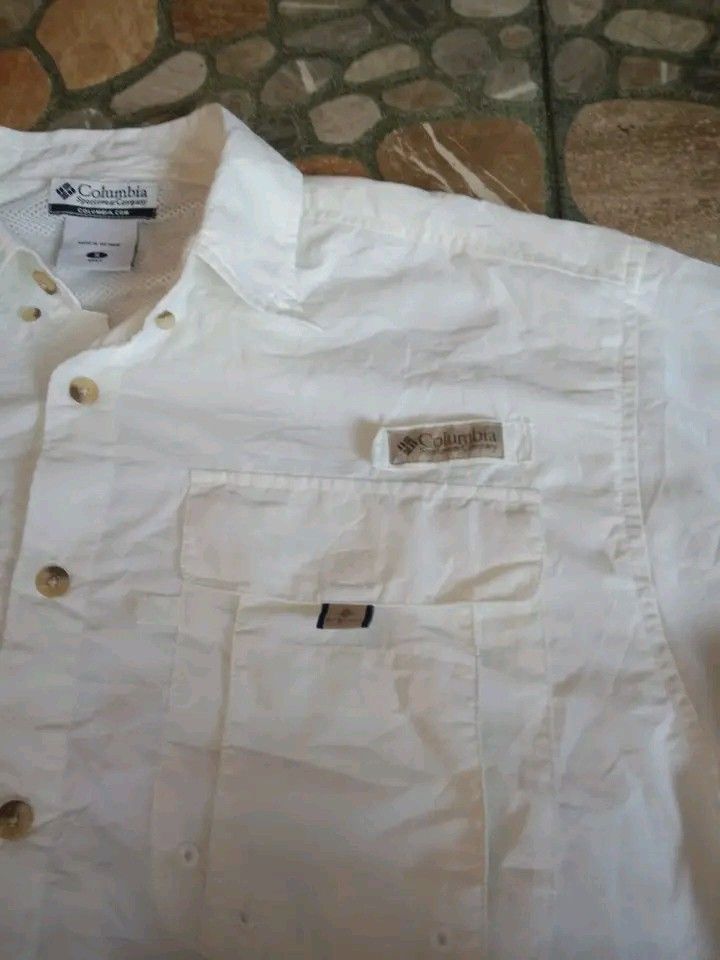 Columbia PFG button down Short Sleeve Polo. (Category: Other Sports Equipment and Supplies) located in Dasmarinas. Submitted by francoprancisco (Listing ID 1464662817, Image 2). Description: Columbia PFG button down Short Sleeve Polo. Large 22 x 28.5 dimes. quickdry/lightweight.back vented. white na white. no flaws no issue. 550 plus sfee..