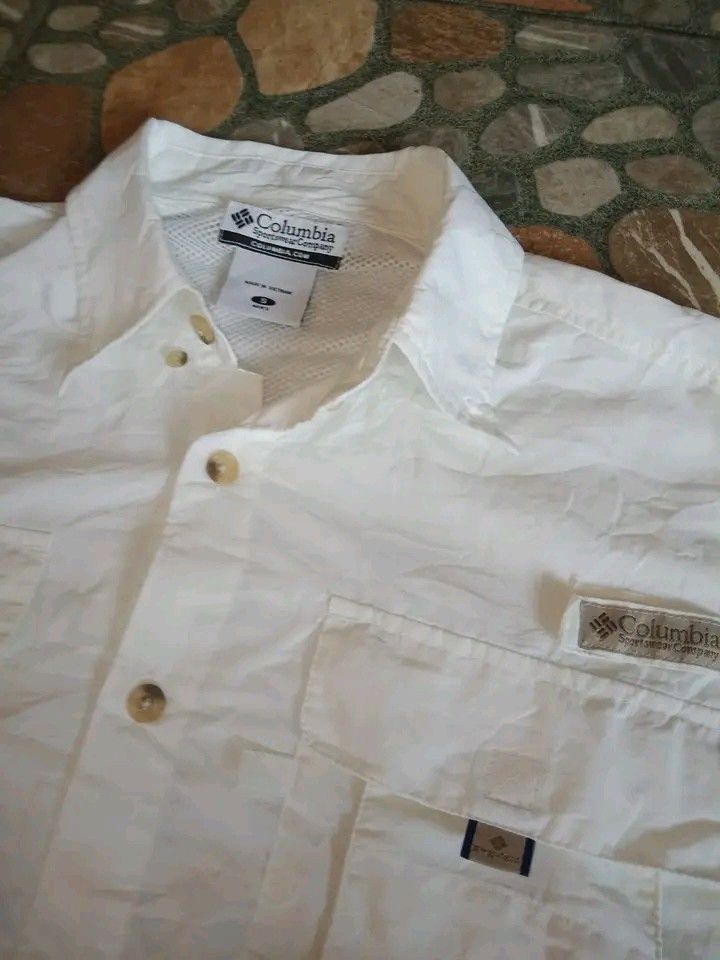 Columbia PFG button down Short Sleeve Polo. (Category: Other Sports Equipment and Supplies) located in Dasmarinas. Submitted by francoprancisco (Listing ID 1464662817, Image 3). Description: Columbia PFG button down Short Sleeve Polo. Large 22 x 28.5 dimes. quickdry/lightweight.back vented. white na white. no flaws no issue. 550 plus sfee..