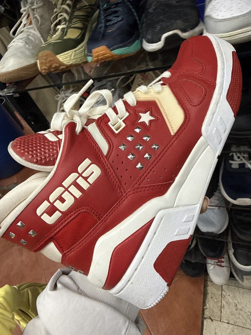 Converse CONS Red White Studded High Top Sneakers (Category: Sneakers) located in Manila. Submitted by fastlion.584bdf (Listing ID 1464732477, Image 1). Description: - Brand/Model: Converse CONS - Color: Red and white with metal stud details on the side and heel - Style: High top with chunky sole and white laces - Size: Men's 8 / Women's 9.5 / EUR 41 / 260 mm - Materials: Leather upper, textile lining, rubber outsole - Origin: Made in Vietnam.