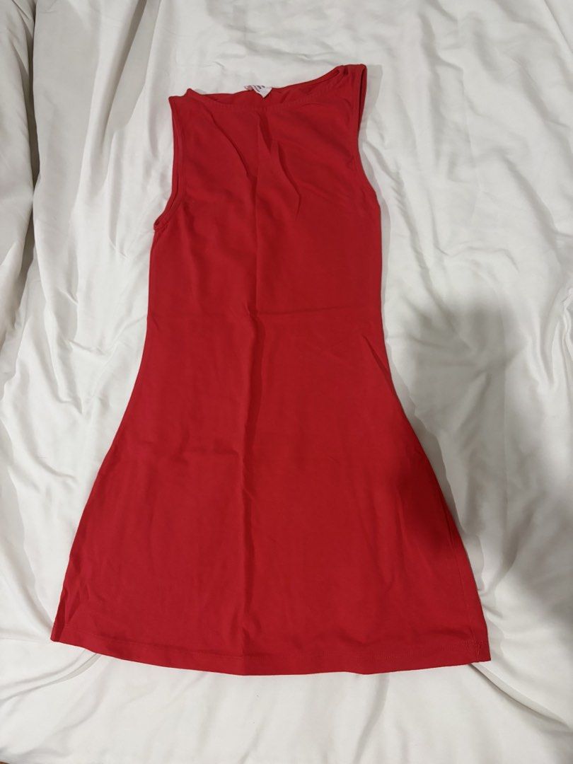 Cotton On Red Sleeveless Dress (Category: Dresses) located in Quezon City. Submitted by floresdette (Listing ID 1464708382, Image 1). Description: - Brand: Cotton On - Used once - Style: Sleeveless with a classic crew neckline - Length: Mid-thigh - Material: Soft and comfortable stretch cotton - Size: 2XS but fits Small. I am size 26 waistline - Condition: Great for quick, effortless casual daytime outfits.