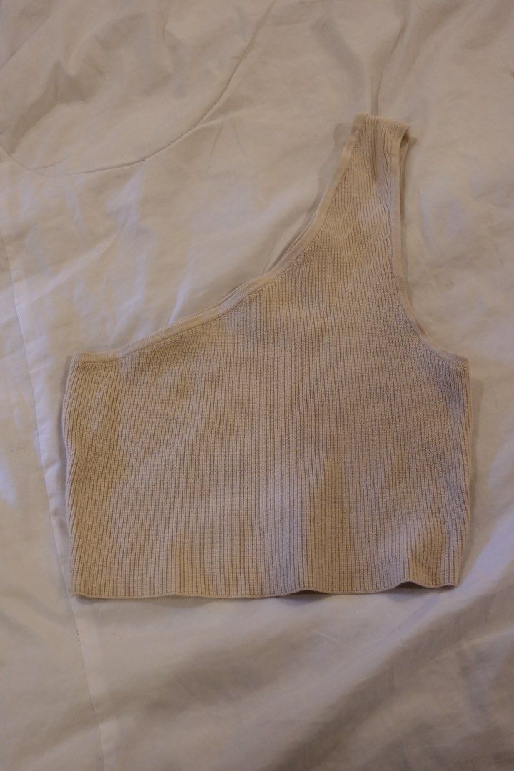 Cotton On Ribbed One Shoulder Tank Top M (Category: Sleeveless) located in Pasig City. Submitted by hulyascloset (Listing ID 1464622210, Image 1). Description: - Brand: Cotton On - Color: Cream - Style: Ribbed one-shoulder tank top - Size: Medium (M) - Material: Stretchy - Features: Versatile wardrobe essential, easy to pair with anything RFS used only TWICE!.