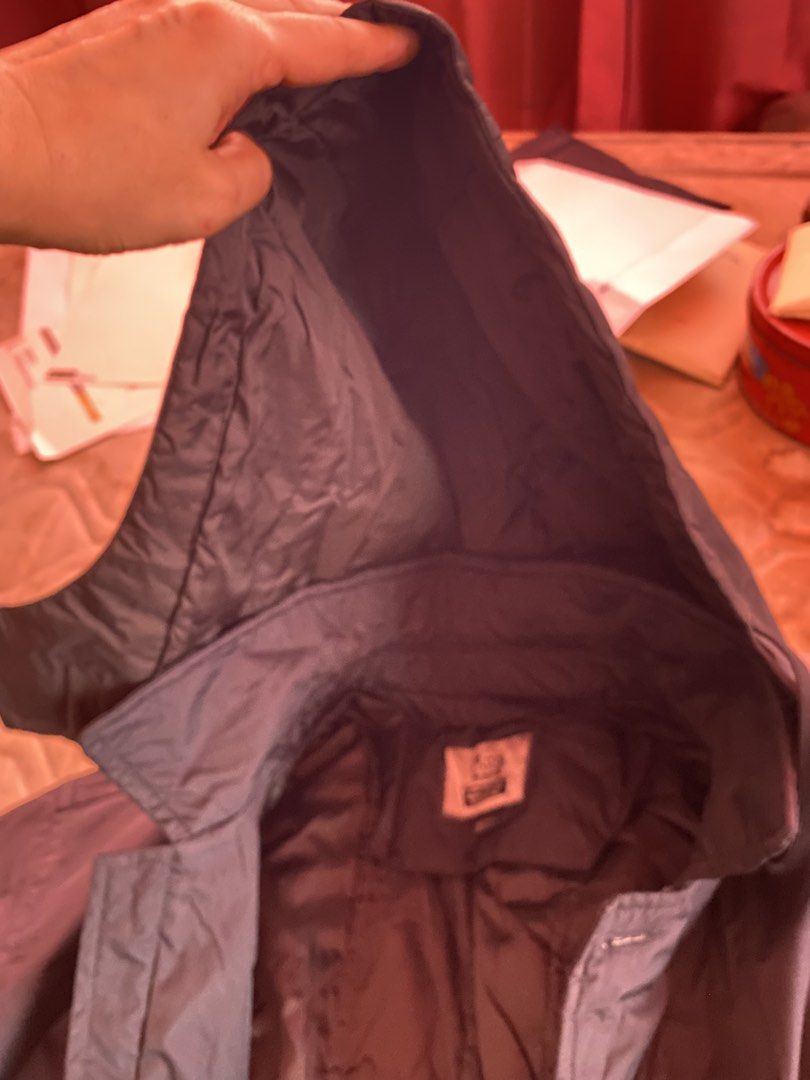 CP Company Black Hooded Jacket (Category: Coats, Jackets and Outerwear) located in Mandaluyong City. Submitted by mommykondo (Listing ID 1464602162, Image 2). Description: - Black winter jacket - Features a detachable hood - Zip and button closure for secure fit - Two chest pockets and two lower pockets for ample storage - Quilted lining for added warmth - Ideal for cooler weather conditions - Feel free to ask any questions!.