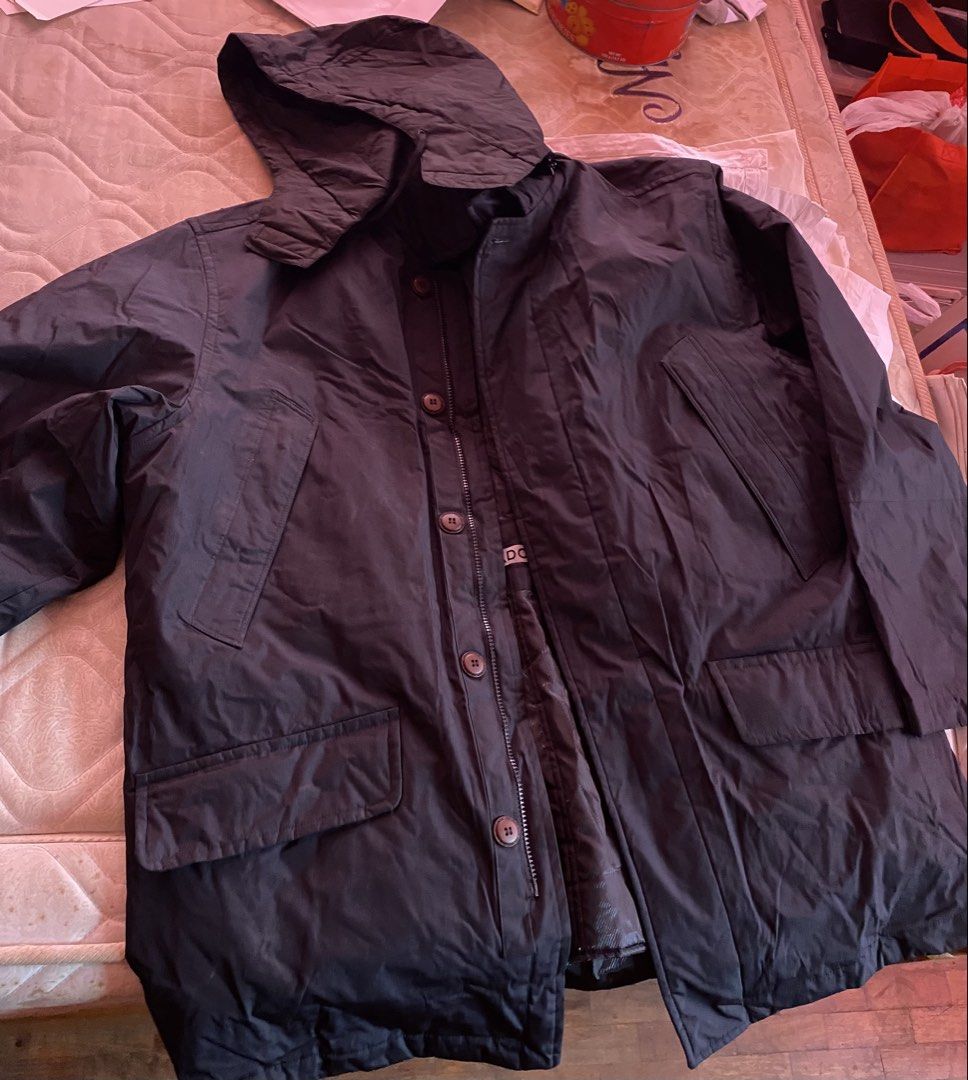 CP Company Black Hooded Jacket (Category: Coats, Jackets and Outerwear) located in Mandaluyong City. Submitted by mommykondo (Listing ID 1464602162, Image 1). Description: - Black winter jacket - Features a detachable hood - Zip and button closure for secure fit - Two chest pockets and two lower pockets for ample storage - Quilted lining for added warmth - Ideal for cooler weather conditions - Feel free to ask any questions!.