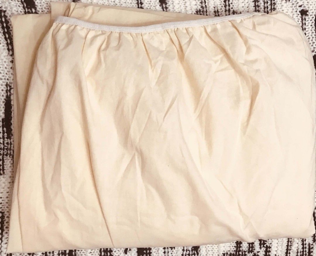 Cream Fitted Sheet with Elastic Edges (Category: Bedding & Towels) located in Imus. Submitted by stop_shop7 (Listing ID 1464630925, Image 2). Description: - Cream colored fitted sheet - Elastic all around edges for a secure fit - Comfortable cotton-like material - Clean and ready for immediate use - Issue: washale stain Loc: Imus, Cavite Delivery: flash Express/Lalamove (Buyer Shoulders Shipping) MOP: Gcash/Bank Policy: Strictly payment first bef