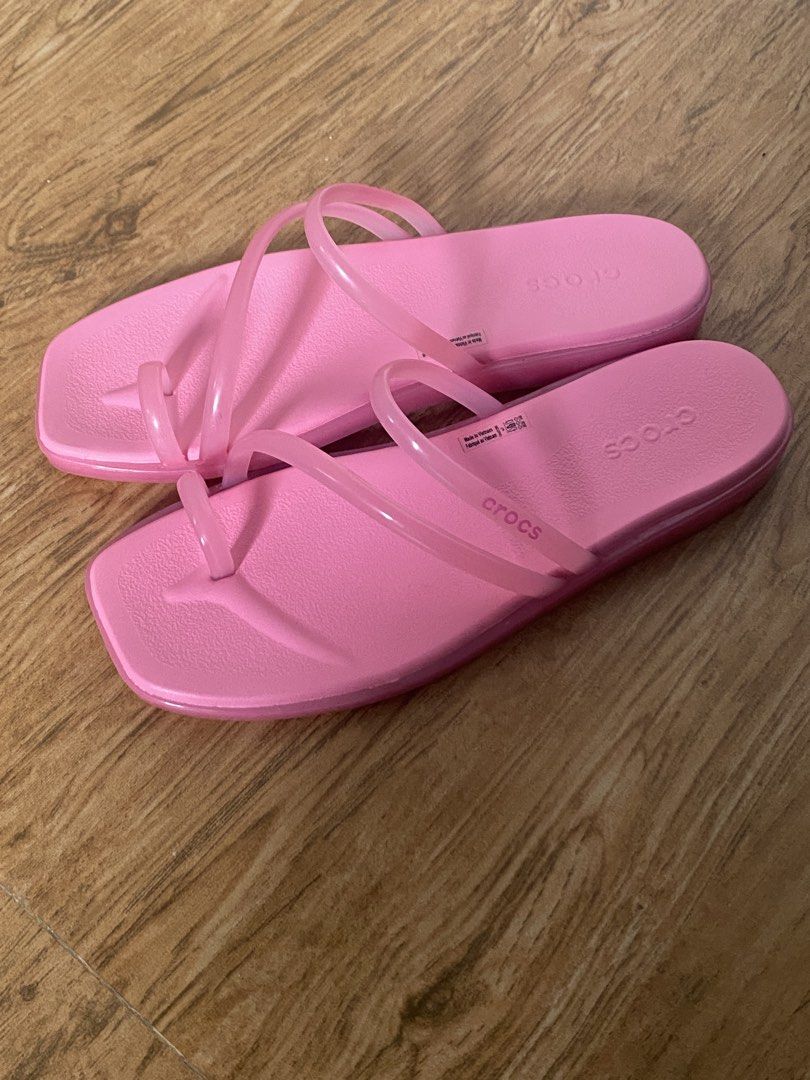 Crocs Miami Jelly Toe Loop Sandals Pink W7 (Category: Sandals) located in Caloocan City. Submitted by zzhanzz (Listing ID 1464644893, Image 1). Description: - Pink Crocs Miami Jelly Toe Loop Sandals - Size: Women's 7 (W7) - Condition: worn once, still in very good condition - Style: Super cute and comfy, great for casual wear - Reason for selling: Just taking up closet space - i have the tag and original packaging i will put it in the plastic :).