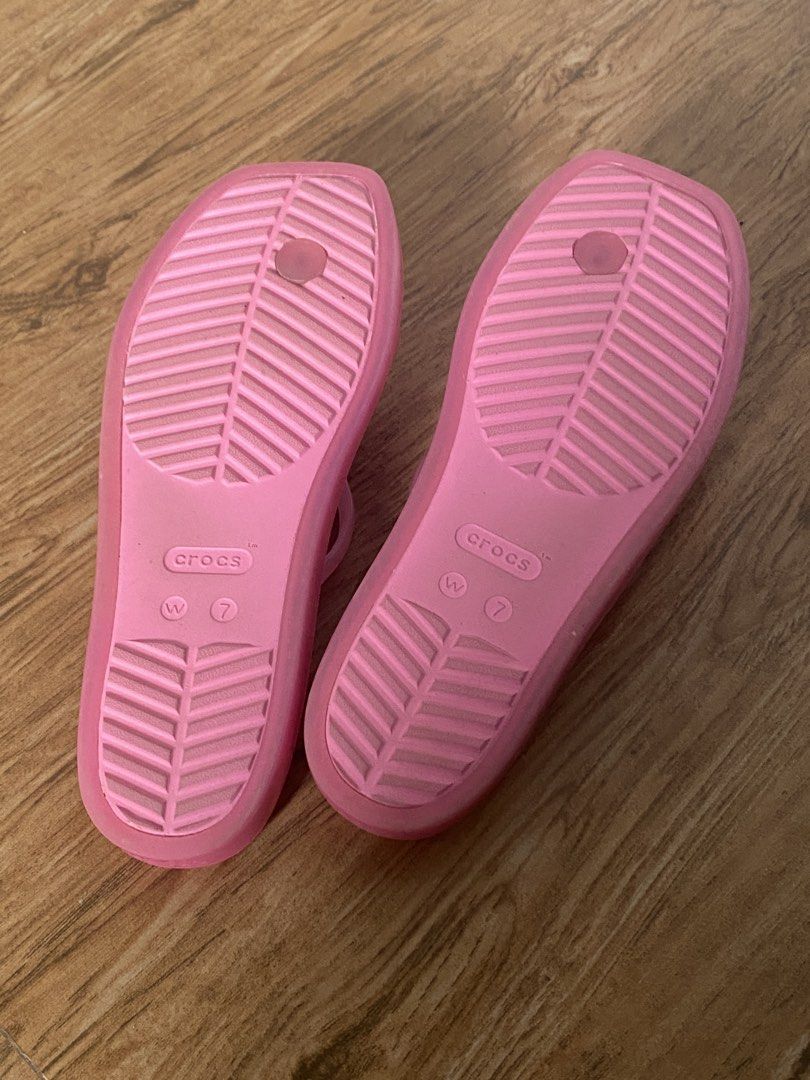 Crocs Miami Jelly Toe Loop Sandals Pink W7 (Category: Sandals) located in Caloocan City. Submitted by zzhanzz (Listing ID 1464644893, Image 3). Description: - Pink Crocs Miami Jelly Toe Loop Sandals - Size: Women's 7 (W7) - Condition: worn once, still in very good condition - Style: Super cute and comfy, great for casual wear - Reason for selling: Just taking up closet space - i have the tag and original packaging i will put it in the plastic :).