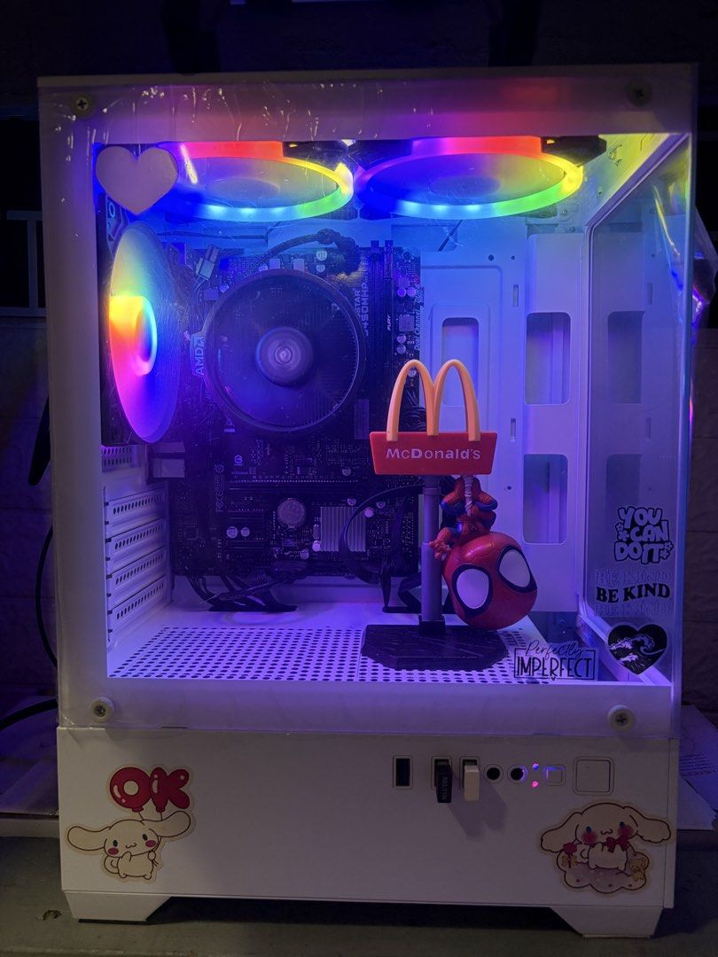 All white PC Setup (Category: Desktops) located in Manila. Submitted by k.myles_iv (Listing ID 1464703778, Image 2). Description: - Complete white gaming PC tower with RGB fans and a clear glass side panel - AMD motherboard setup with stock CPU cooler - Bundle includes: white monitor, light green Miniso keyboard, matching mouse, Inplay Monitor bracket and speaker - Fully functional desktop setup, tested and ready for daily use and gaming - Perfec