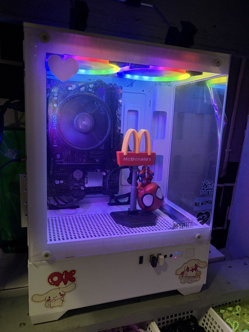 All white PC Setup (Category: Desktops) located in Manila. Submitted by k.myles_iv (Listing ID 1464703778, Image 3). Description: - Complete white gaming PC tower with RGB fans and a clear glass side panel - AMD motherboard setup with stock CPU cooler - Bundle includes: white monitor, light green Miniso keyboard, matching mouse, Inplay Monitor bracket and speaker - Fully functional desktop setup, tested and ready for daily use and gaming - Perfec