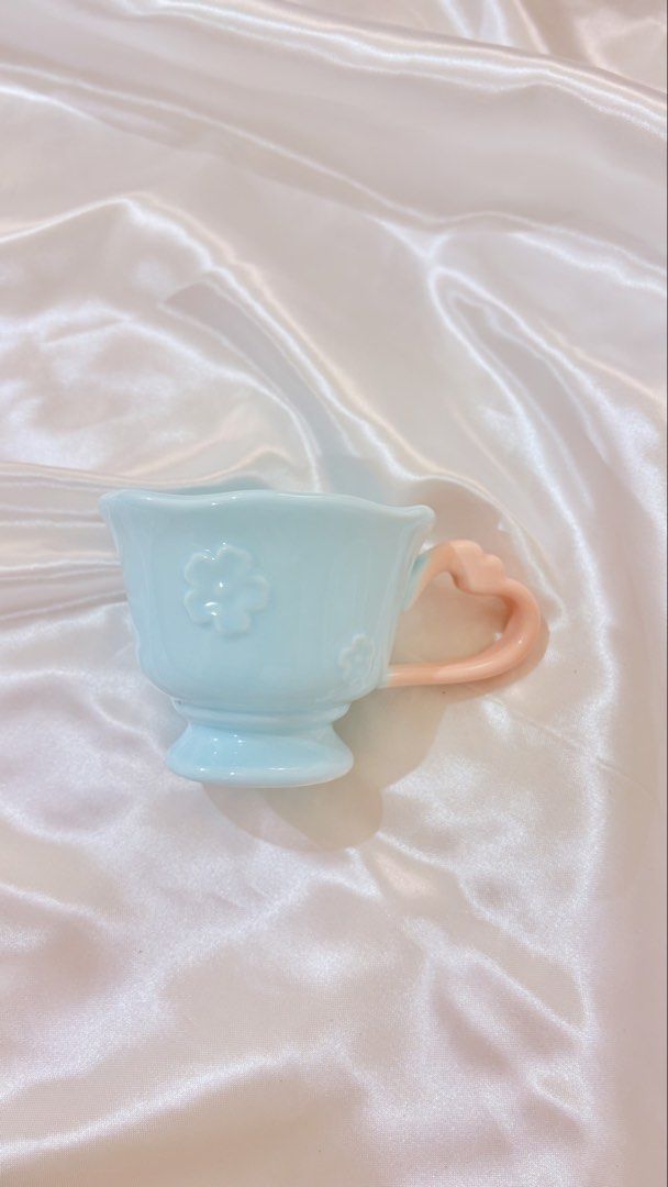 Cute Ceramic Mugs - 199 each (Category: Coffee & Tea Tableware) located in Manila. Submitted by declutteringmyclosetttt (Listing ID 1464584503, Image 1). Description: - Set of 5 unique ceramic mugs - Light blue mug with flower details and heart handle - Pale yellow goblet-style mug - Peachy pink mug with a round handle - Cream mug featuring a cat and flower design - Red and white pig mug - Ideal for coffee, tea, or hot chocolate - Makes a great g