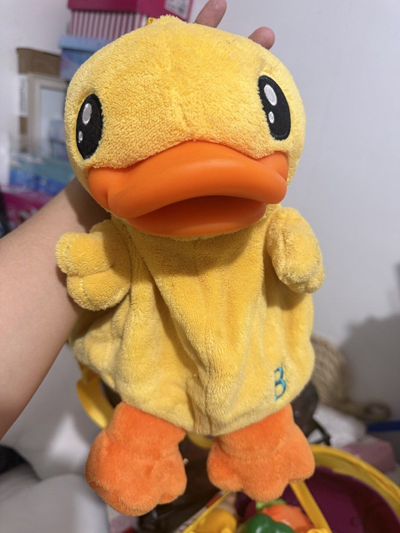 Cute Plush Yellow b.duck Backpack Bag (Category: Backpacks) located in Quezon City. Submitted by parischanelcollection (Listing ID 1464743772, Image 1). Description: - Super soft and fuzzy bright yellow duck plush backpack - Features a big 3D orange beak, embroidered black eyes, and dangling little feet - Zipper pocket on the back for your essentials - Adjustable yellow shoulder straps for a comfortable fit - Fun and quirky statement piece for da