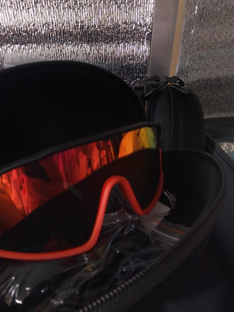 Rush sale!! (Category: Sunglasses & Eyewear) located in Caloocan City. Submitted by luckyturtle.aa6ccf (Listing ID 1464602460, Image 2). Description: - Bright orange frame - Reflective lenses - Perfect for cycling and outdoor sports - Includes a protective hard case - Soft pouch included inside the case - Ready for your next adventure!.