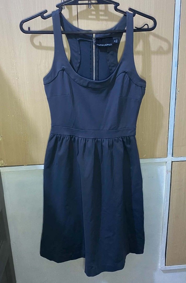 Cynthia Rowley Dress (Category: Dresses) located in Las Pinas. Submitted by modemnl (Listing ID 1464738694, Image 1). Description: Size: XS-Medium | Color: Dark Gray Stylish and feminine Cynthia Rowley dress featuring a flattering, slightly sexy neckline/top design. The dress has a convenient back zipper and two side pockets, combining a polished look with everyday practicality. -Flattering, feminine top design -Thick Cloth -Back zipper closure -
