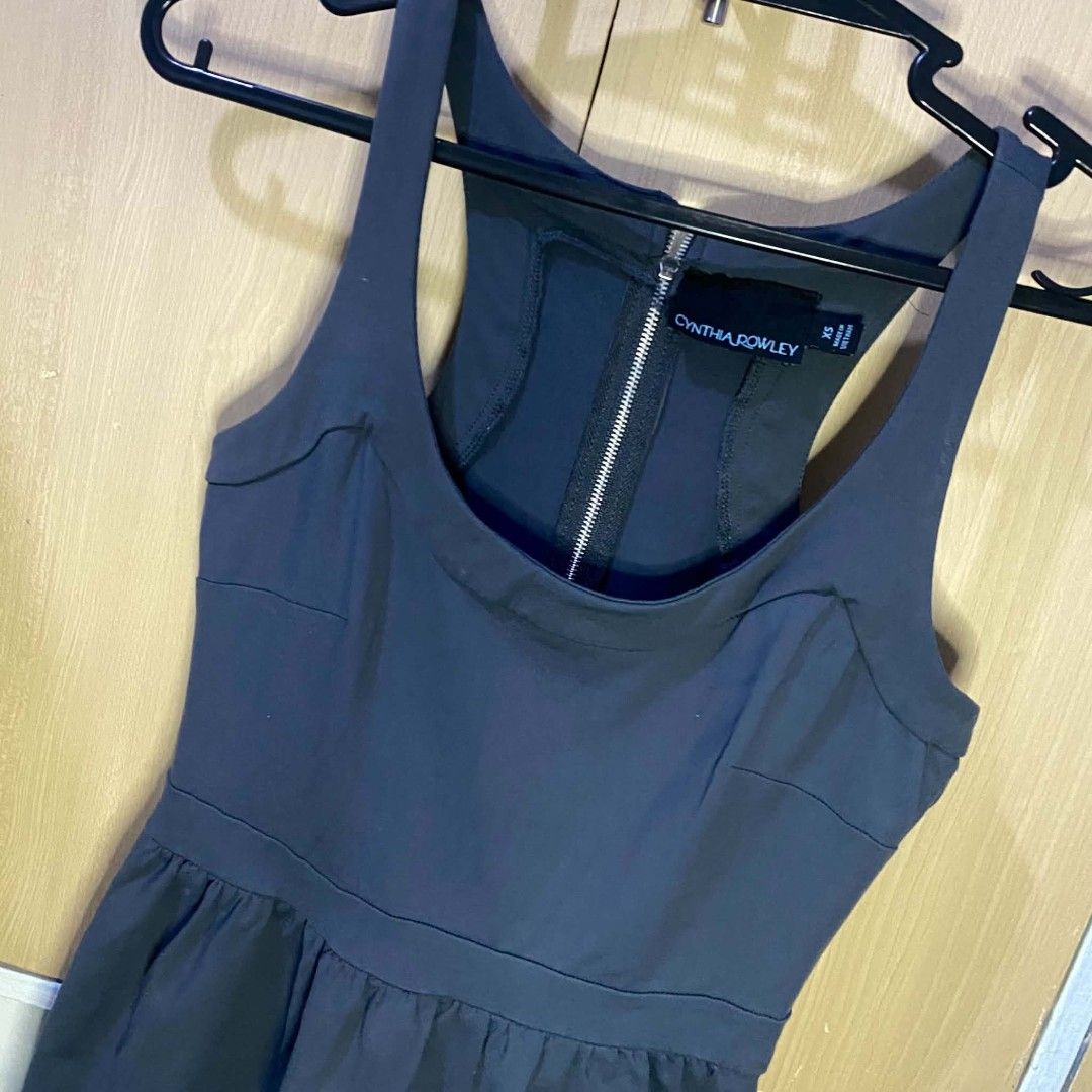Cynthia Rowley Dress (Category: Dresses) located in Las Pinas. Submitted by modemnl (Listing ID 1464738694, Image 3). Description: Size: XS-Medium | Color: Dark Gray Stylish and feminine Cynthia Rowley dress featuring a flattering, slightly sexy neckline/top design. The dress has a convenient back zipper and two side pockets, combining a polished look with everyday practicality. -Flattering, feminine top design -Thick Cloth -Back zipper closure -