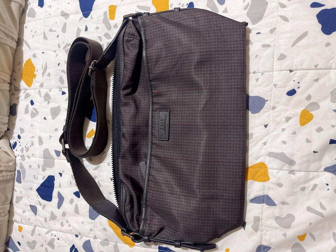 DAKS Houndstooth Pattern Crossbody Bag (Category: Cross-body Bags) located in Quezon City. Submitted by donnabelle7572 (Listing ID 1464696272, Image 1). Description: - Authentic DAKS crossbody bag - Model DB28 4F833 01 - Unisex -Length-12"; Height 9"; width-3.5".