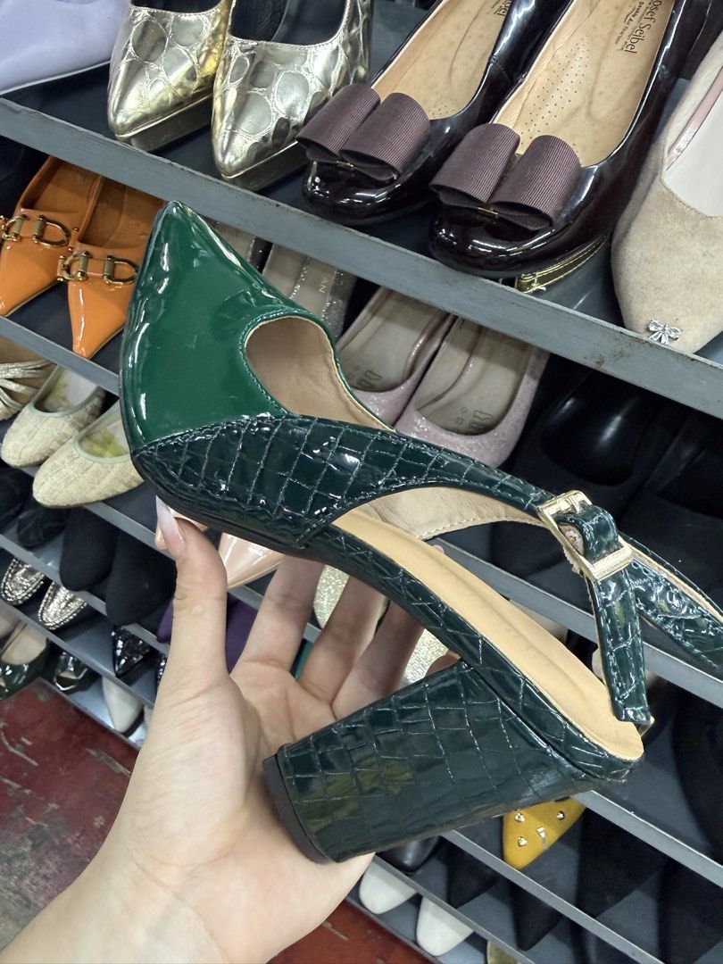 Dark Green Croc Embossed Pointed Toe Slingback Block Heels (Category: Heels) located in Manila. Submitted by fastlion.584bdf (Listing ID 1464737606, Image 1). Description: - Color: Dark green with glossy pointed toe - Texture: Croc-embossed heel section - Heel: Stable block heel for comfortable height - Closure: Adjustable buckle slingback strap - Size: Marked 250 (1.5) on the sole - Condition: Clean inner lining, well-maintained.
