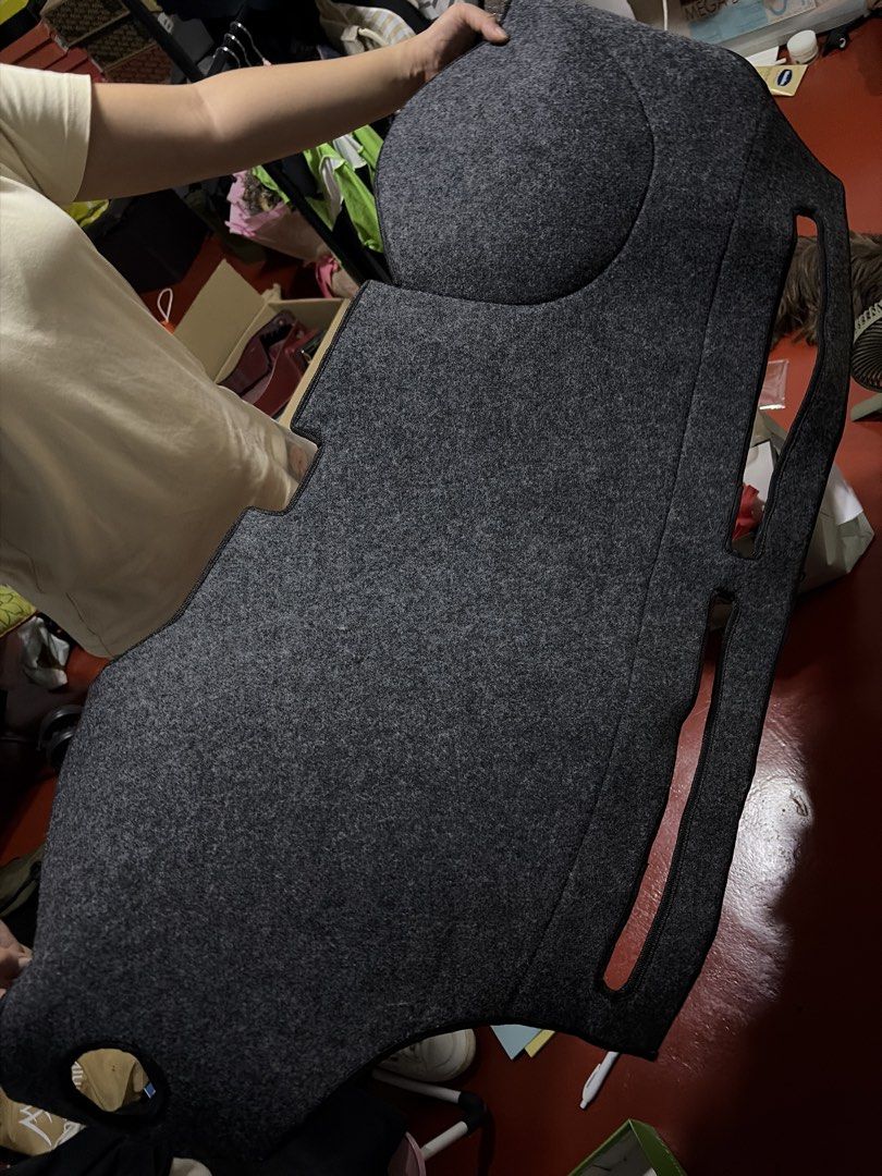 Dark Grey Felt Car Dashboard Cover Mat Sunshade (Category: Carpets, Mats & Flooring) located in Manila. Submitted by finderskeepersmnl_092026 (Listing ID 1464726491, Image 1). Description: - Color: Dark grey felt - Condition: Clean, no tears or loose threads - Reduces annoying sun glare on the windshield - Protects dashboard from heat damage and fading - Pre-cut holes for air vents and sensors - Durable black stitched edges.
