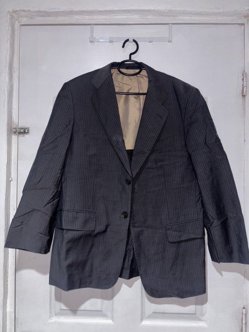 Dark Grey Pinstripe Blazer (Category: Coats, Jackets and Outerwear) located in San Juan City. Submitted by mcstxtian_ (Listing ID 1464626500, Image 1). Description: Decluttering!! Pinstripes design. Size: 18 x 28 - Classic dark grey blazer with subtle pinstripes - Versatile for formal or smart casual occasions..
