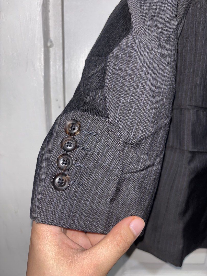 Dark Grey Pinstripe Blazer (Category: Coats, Jackets and Outerwear) located in San Juan City. Submitted by mcstxtian_ (Listing ID 1464626500, Image 2). Description: Decluttering!! Pinstripes design. Size: 18 x 28 - Classic dark grey blazer with subtle pinstripes - Versatile for formal or smart casual occasions..