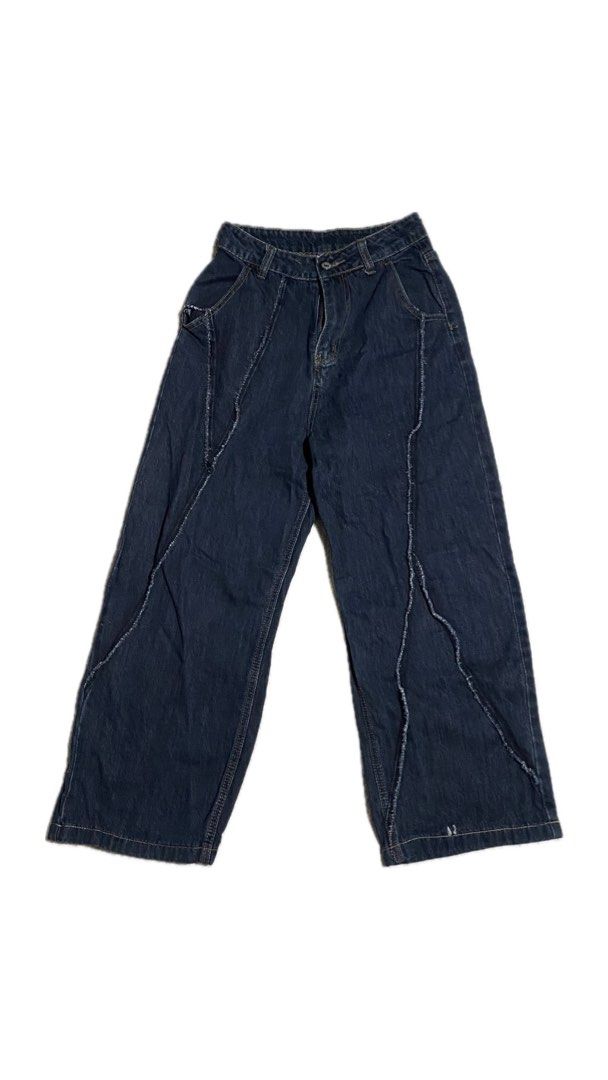 Dark Wash Wide Leg Jeans with Unique Stitching (Category: Jeans) located in Manila. Submitted by riestyled (Listing ID 1464667254, Image 1). Description: Size: 25 Length: 36 - Dark wash denim jeans - Trendy wide leg cut - Unique contrast stitching along seams - Secure button and zip fly closure - Distinctive look, great for casual outfits.