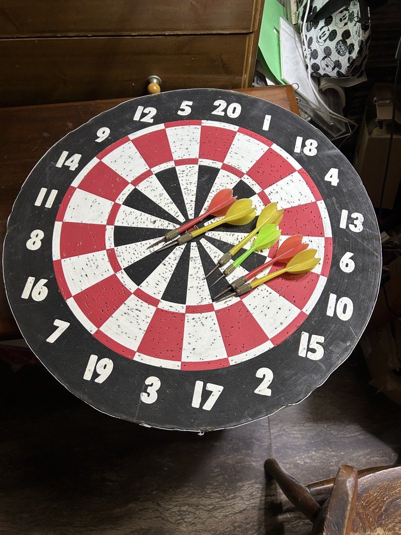 Dartboard with 6 Darts (Category: Action & Battle Toys) located in Caloocan City. Submitted by guitara1822 (Listing ID 1464662344, Image 1). Description: - Standard dartboard with numbers - Includes 6 darts (3 red, 3 yellow) - Board has some wear on the edges - Ideal for game nights or target practice.