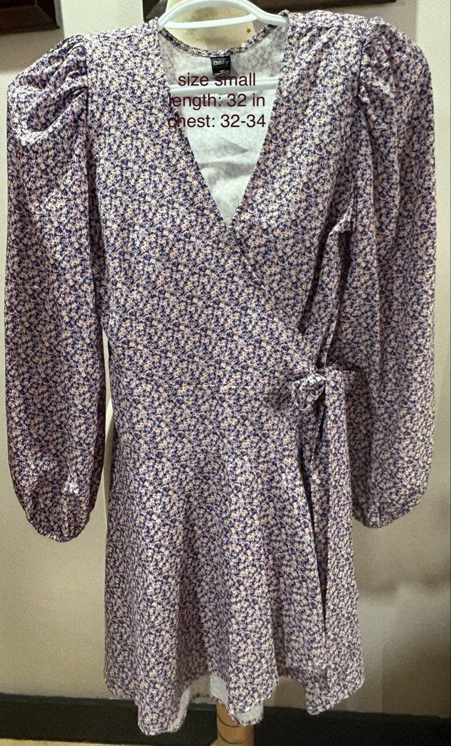 DAZY Floral Wrap Dress Size Small (Category: Dresses) located in Cavite. Submitted by momskiette (Listing ID 1464579450, Image 2). Description: - Cute floral wrap dress from DAZY - Features puff sleeves - Adjustable tie waist - Length: 32 inches - Chest: 32-34 inches - waist : 24-26 inches - Versatile for casual outings or dressing up.