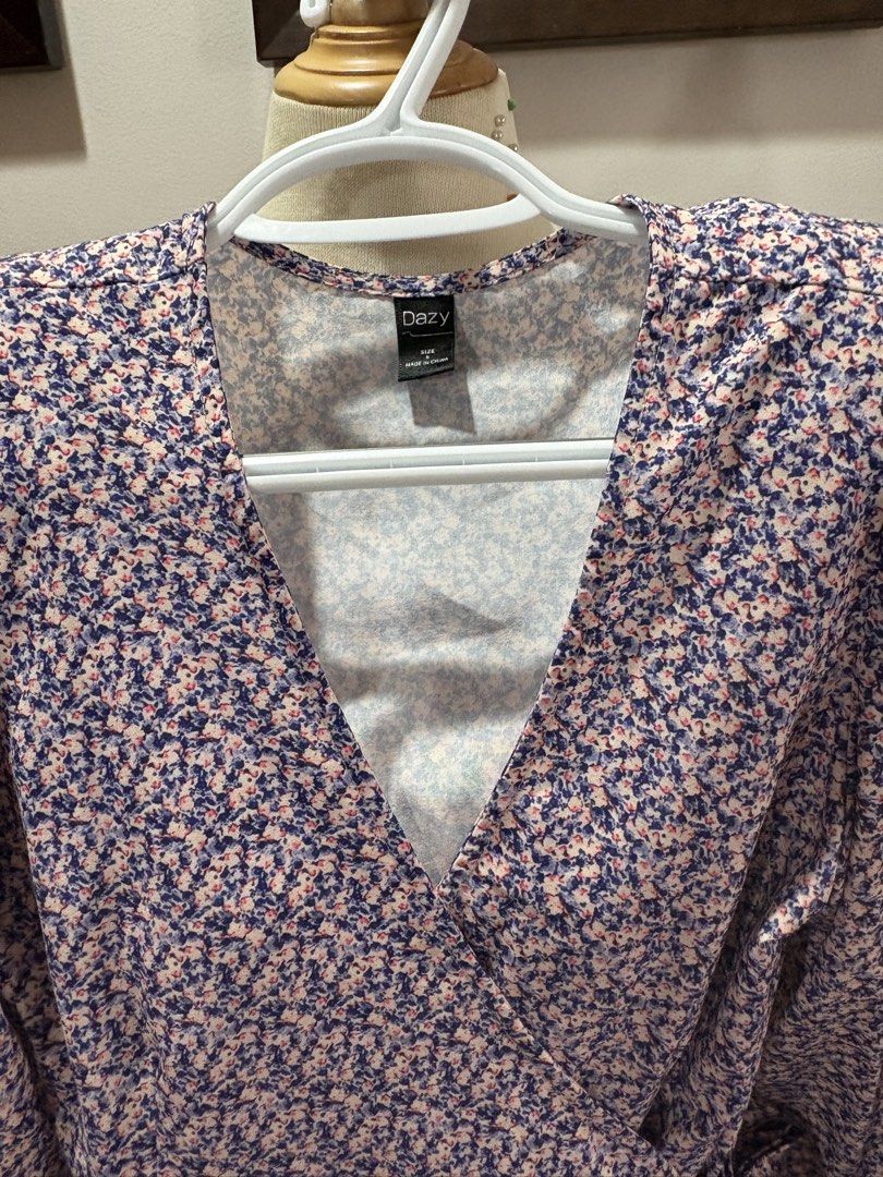 DAZY Floral Wrap Dress Size Small (Category: Dresses) located in Cavite. Submitted by momskiette (Listing ID 1464579450, Image 1). Description: - Cute floral wrap dress from DAZY - Features puff sleeves - Adjustable tie waist - Length: 32 inches - Chest: 32-34 inches - waist : 24-26 inches - Versatile for casual outings or dressing up.