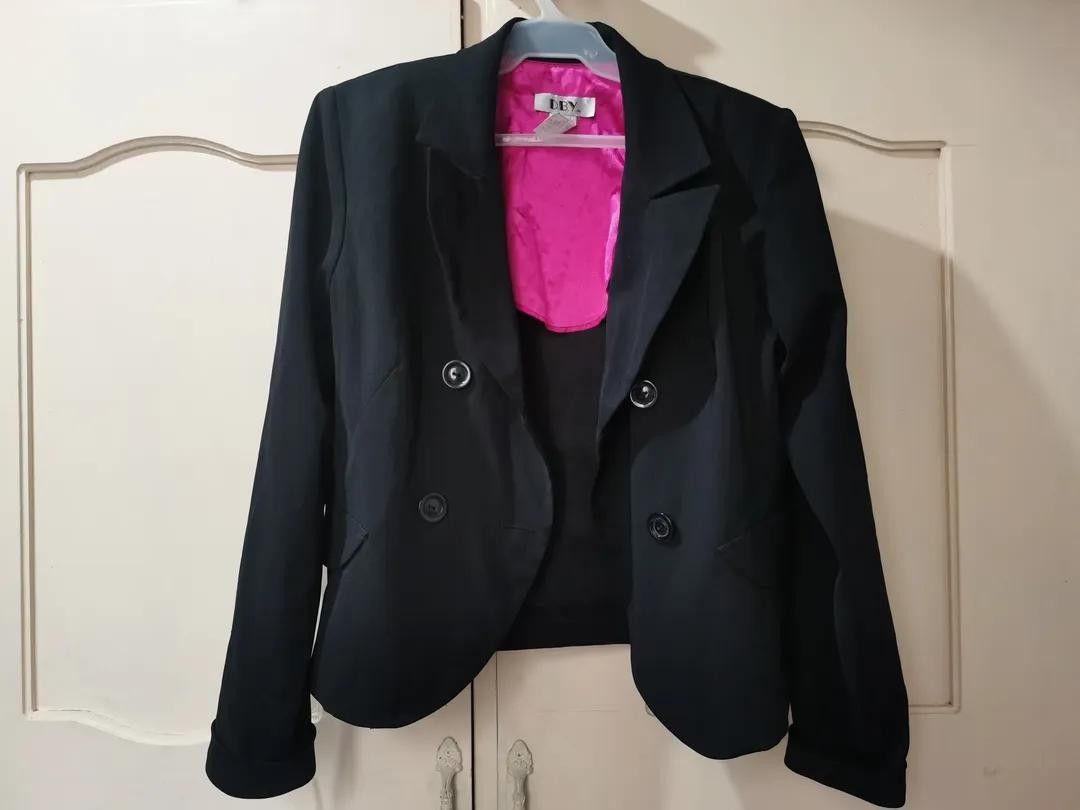 D.B.Y. Black Double-Breasted Blazer with Pink Lining (Category: Coats, Jackets and Outerwear) located in Caloocan City. Submitted by oddforest_3f98ed (Listing ID 1464641538, Image 1). Description: - D.B.Y. black blazer - Bright pink satin lining - Double-breasted with two button closures - Sharp and stylish design - Ideal for dressing up outfits - Made in Sri Lanka.