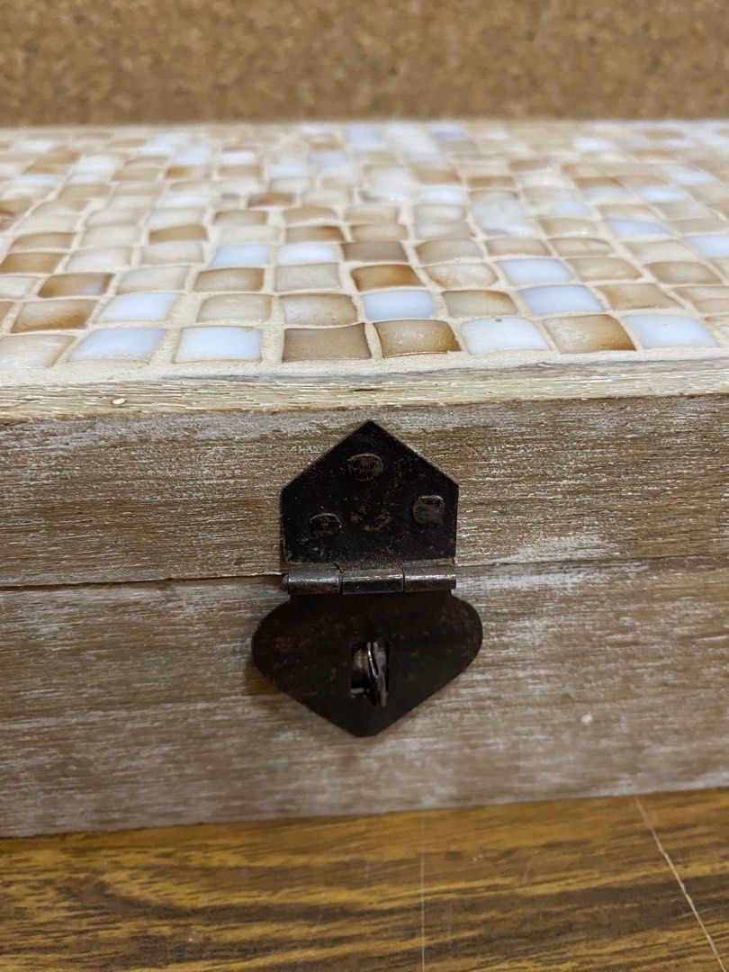Decorative Wooden Shell Inlay Storage Box (Category: Storage Boxes & Baskets) located in Calamba. Submitted by chebvintagedepot (Listing ID 1464606764, Image 3). Description: [B19-03] This decorative wooden box has a natural-finished wooden frame with a checkered mosaic-style pattern made from square shell pieces on the lid. The shell inlay is arranged in neutral white and beige tones, giving the box a simple geometric look. It can be used for sm