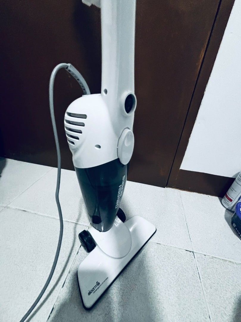 Deerma Handheld Vacuum Cleaner (Category: Vacuum Cleaner & Housekeeping) located in Dasmarinas. Submitted by titaniumrosegold (Listing ID 1464607342, Image 2). Description: - Deerma handheld vacuum cleaner - Color: White and dark grey - Power type: Corded electric - Ideal for quick cleanups - Fully functional, works well rfs decluttering.