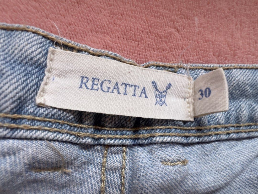 Denim Shorts (Category: Shorts) located in Batangas. Submitted by alaisaampa7513 (Listing ID 1464570998, Image 2). Description: - Brand: Regatta - Style: Light wash denim shorts - Features: Distressed ripped front, cuffed hems - Closure: Button and zip - Occasion: Casual, everyday wear.