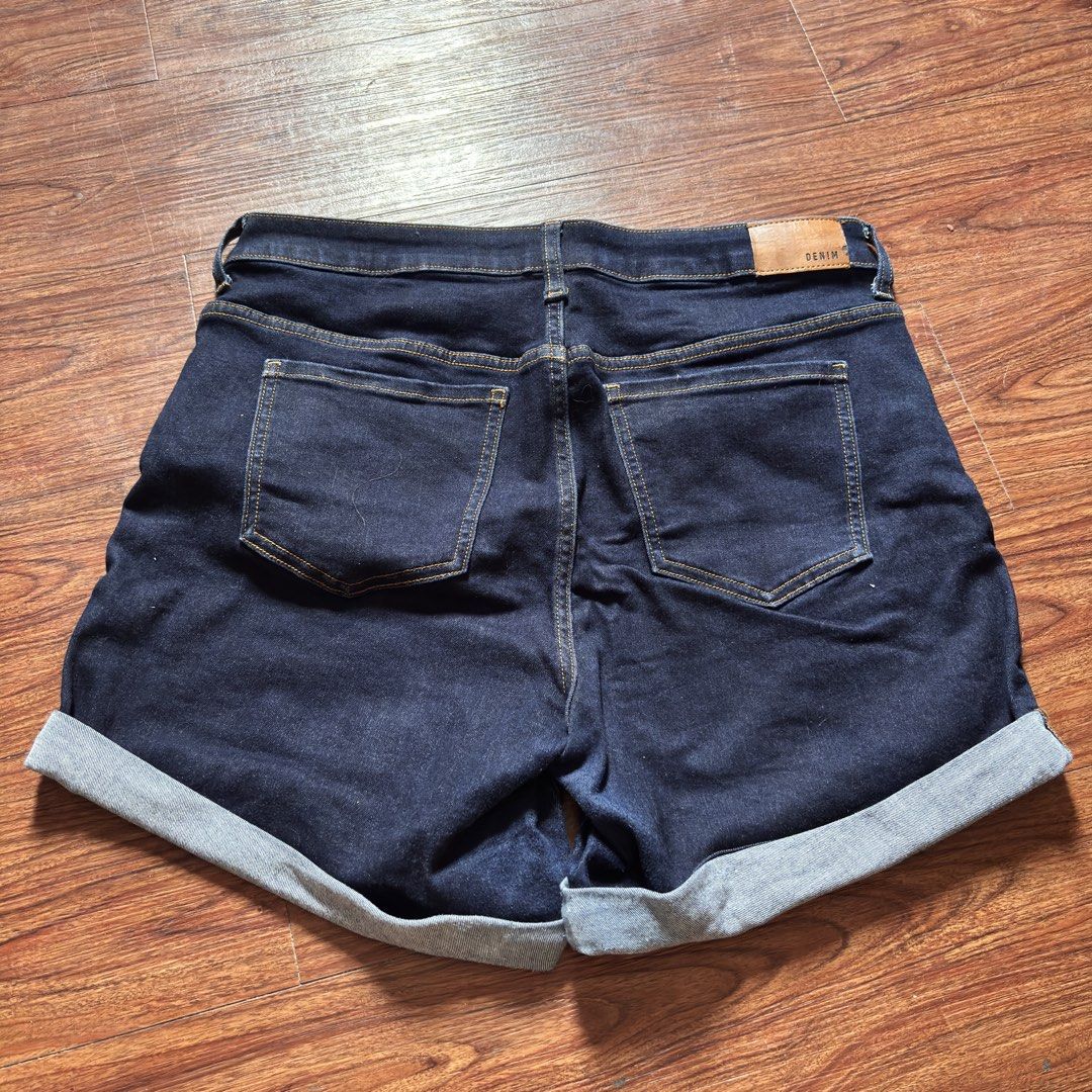 Denim Shorts Size 12 (Category: Shorts) located in Angeles City. Submitted by uzifinds (Listing ID 1464584240, Image 2). Description: - Dark wash denim shorts - High-waisted style - Cuffed hem - Classic five-pocket design - Button and zip closure - Durable denim with a nice weight - Ideal for casual outfits.