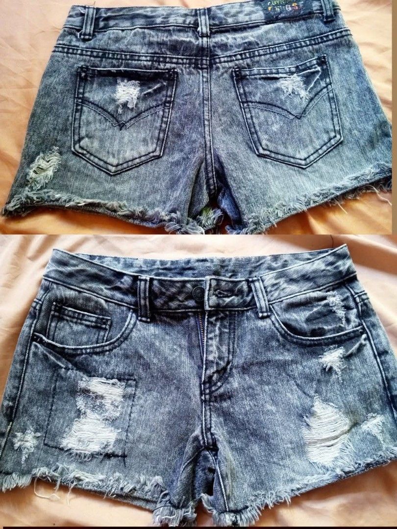 Denim Shorts with Patches Size 25 (Category: Shorts) located in Bacoor. Submitted by leah.92 (Listing ID 1464571479, Image 2). Description: - Grey denim shorts - Distressed look with ripped details and patches - Frayed hem - Button and zip closure - Front and back pockets - Ideal for casual wear.