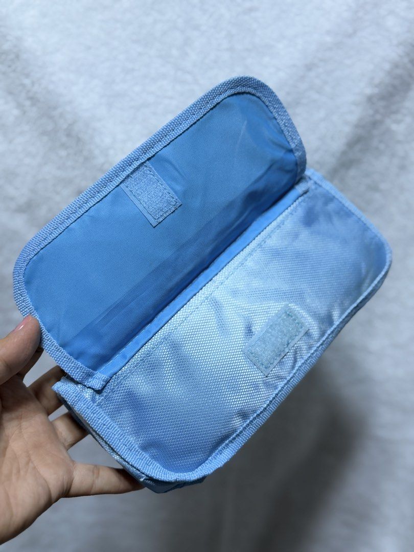 Despicable Me 2 Minions Blue Pencil Case Pouch (Category: Purses & Pouches) located in Baguio. Submitted by aalkharys (Listing ID 1464739248, Image 3). Description: - Authentic Despicable Me 2 Minions graphics - Color: Light blue - Secure top zipper closure - Clean fabric interior with a small velcro pocket - Brand new in original plastic packaging.