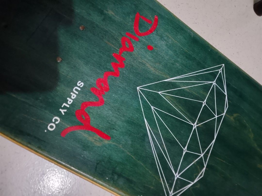 Diamond Supply Co. Skateboard Deck Green Diamond (Category: Skates, Rollerblades & Scooters) located in Quezon City. Submitted by zealstone_baf57c (Listing ID 1464709677, Image 3). Description: - Brand: Diamond Supply Co. - Condition: Brand new, unused deck - Color: Green with white wireframe diamond graphic and red script logo - Size: Approx. 32 inches long x 8 inches wide - Setup: Deck only, ready for your trucks and wheels.