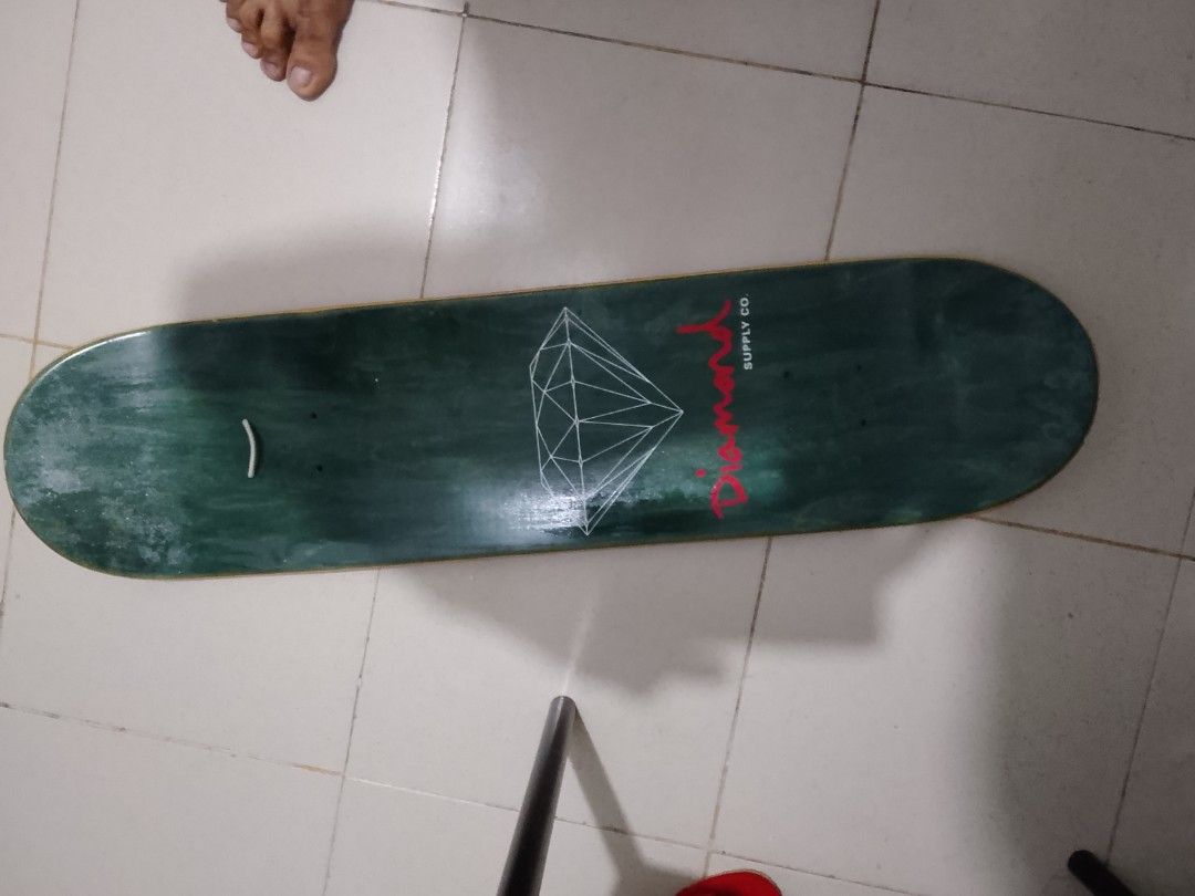 Diamond Supply Co. Skateboard Deck Green Diamond (Category: Skates, Rollerblades & Scooters) located in Quezon City. Submitted by zealstone_baf57c (Listing ID 1464709677, Image 2). Description: - Brand: Diamond Supply Co. - Condition: Brand new, unused deck - Color: Green with white wireframe diamond graphic and red script logo - Size: Approx. 32 inches long x 8 inches wide - Setup: Deck only, ready for your trucks and wheels.
