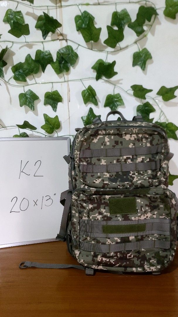Digital Camouflage Tactical Backpack Molle Outdoor Bag (Category: Backpacks) located in Baguio. Submitted by phoeberose33384 (Listing ID 1464765477, Image 1). Description: - Digital camouflage tactical backpack measuring approx. 20" x 13" - Multiple spacious compartments with heavy-duty zippers - Molle webbing on front and sides for extra attachments - Padded mesh shoulder straps with adjustable buckles and cross sternum strap for comfort - Velcr