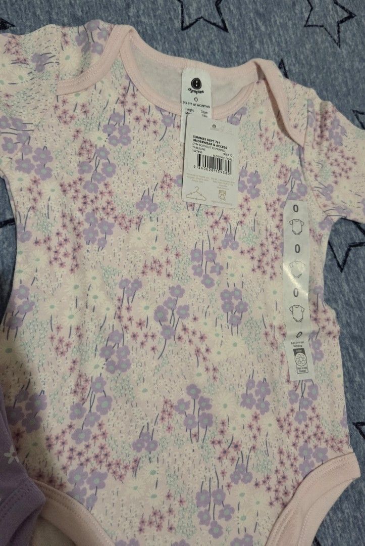 Dimples Baby Bodysuits Size 0 Floral 2-Pack (Category: Babies & Kids Fashion) located in Valenzuela. Submitted by empot08 (Listing ID 1464769413, Image 2). Description: - Brand: Dimples (Both come with original store tags attached) - Size: Size 0, fits up to 12 months (76cm, 10kg) - Set includes: 2 short-sleeve bodysuits (1 lilac with white daisy print, 1 pinkish with multi-color floral pattern) - Material: Ultra-soft cotton for baby's comfort - 