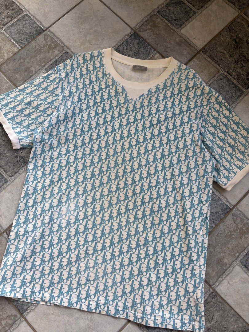 Dior All Over Print T-Shirt (Category: Tshirts & Polo Shirts ) located in Manila. Submitted by 0000.ramen (Listing ID 1464612050, Image 2). Description: Dior Large Width 22 Length 29 In pristine condition Mini fade,mini stain (check photo) .