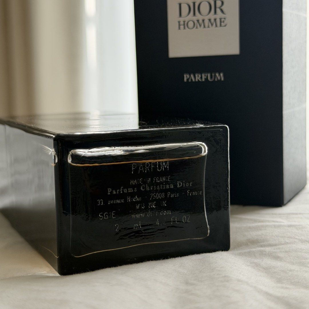Dior Homme Parfum (Category: Fragrance & Deodorants) located in Mabalacat. Submitted by philscabinet (Listing ID 1464656782, Image 2). Description: Dior Homme Parfum - Volume: 125 ml / 4.2 fl. oz. - Approximately 85-90% remaining, around 105ml-110ml (As seen in photo) - Includes Original Box (No dents) - Key Notes: Tuscan Iris, Leather, Oud, Sandalwood, Ambrette (Musk Mallow), Rose - 100% Authentic, Made in Paris France Price is still negotiable.