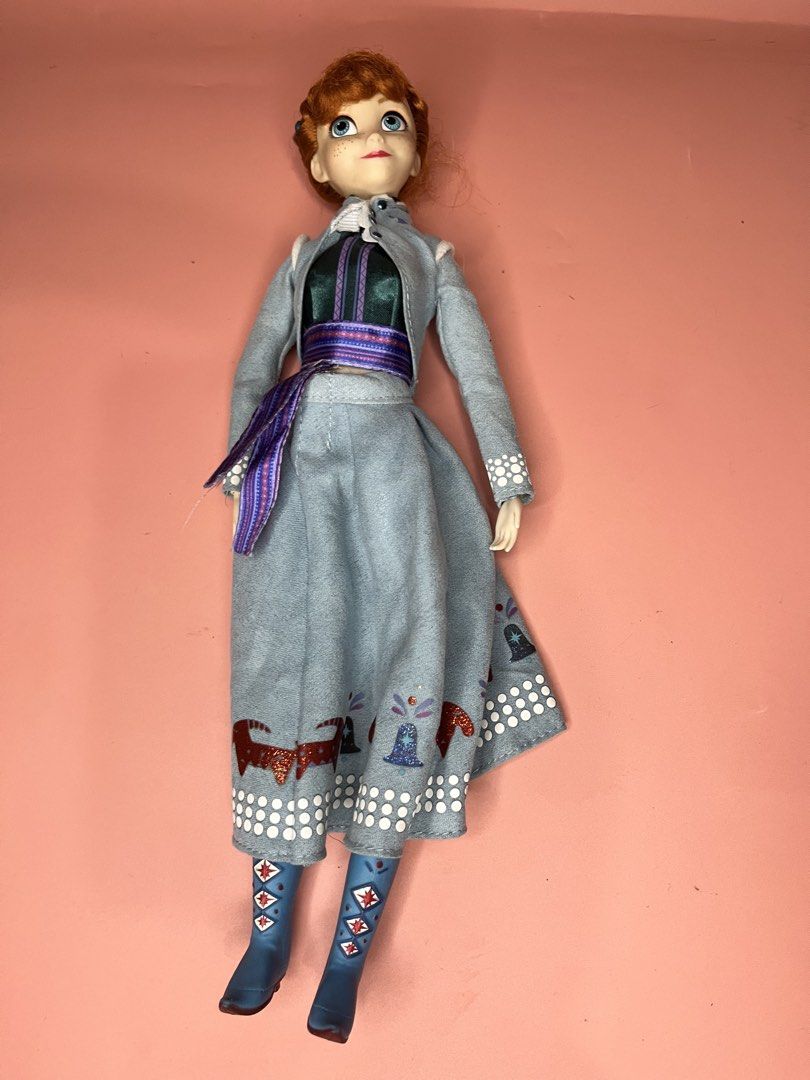 Disney Frozen Anna Doll (Category: Kids Toys) located in Caloocan City. Submitted by snapshop_ph (Listing ID 1464614760, Image 1). Description: - Anna doll from Disney's Frozen - Features her signature outfit: blue jacket, green top, and patterned skirt - Comes with blue boots - Ideal for any fan of the movie Frozen - Made in China.