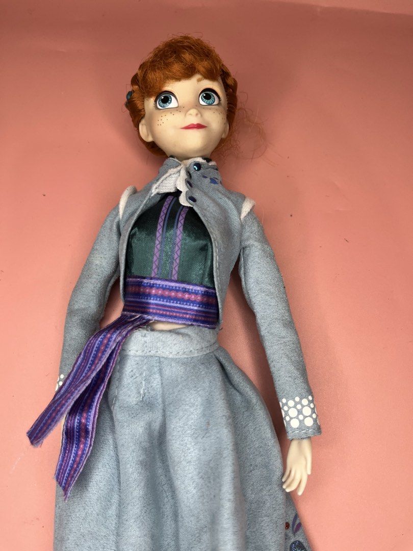 Disney Frozen Anna Doll (Category: Kids Toys) located in Caloocan City. Submitted by snapshop_ph (Listing ID 1464614760, Image 2). Description: - Anna doll from Disney's Frozen - Features her signature outfit: blue jacket, green top, and patterned skirt - Comes with blue boots - Ideal for any fan of the movie Frozen - Made in China.