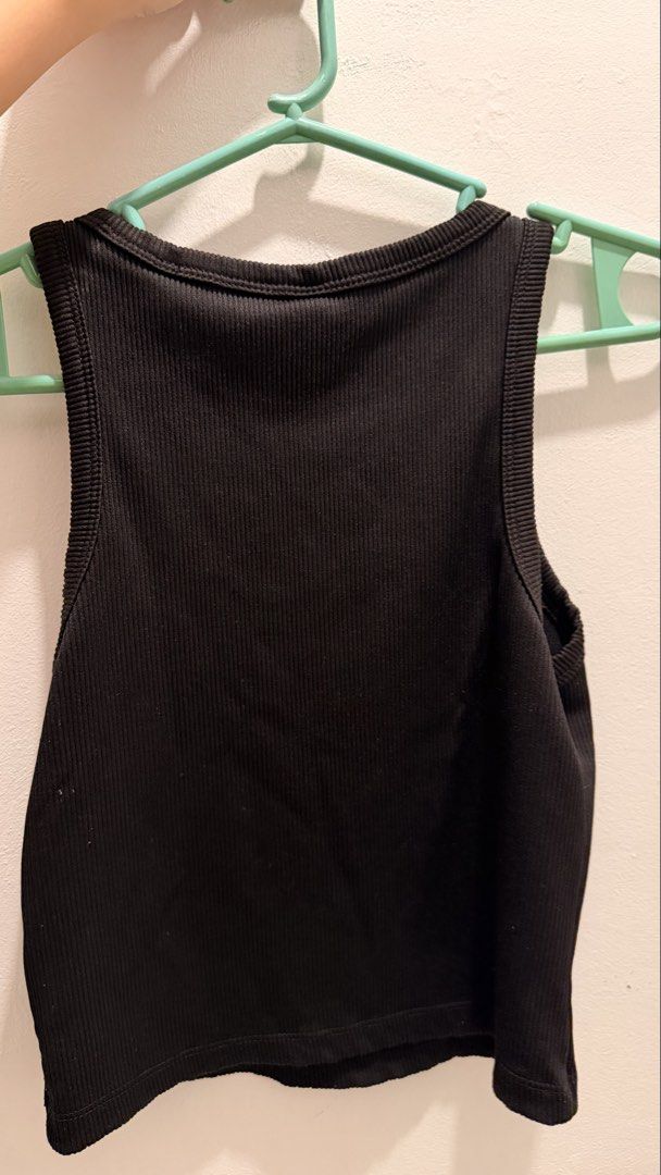 Divided Black Ribbed Cropped Tank Top (Category: Sleeveless) located in Tarlac. Submitted by mariebiscuitttttt (Listing ID 1464641819, Image 2). Description: - used twice - Black ribbed cropped tank top from Divided - Sleeveless with a rounded neckline - Stretchy material for a comfortable fit - Essential basic piece for any wardrobe - Effortlessly pairs with various outfits.